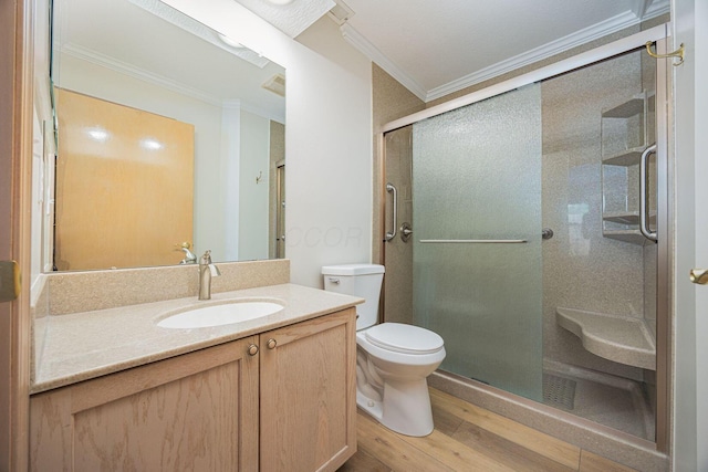 3870 Sandstone Cir, Powell, OH 43065 - bathroom featuring toilet, wood finished floors, a shower stall, vanity, and ornamental molding