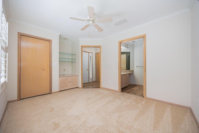 3870 Sandstone Cir, Powell, OH 43065 - unfurnished bedroom with baseboards, crown molding, light colored carpet, and connected bathroom