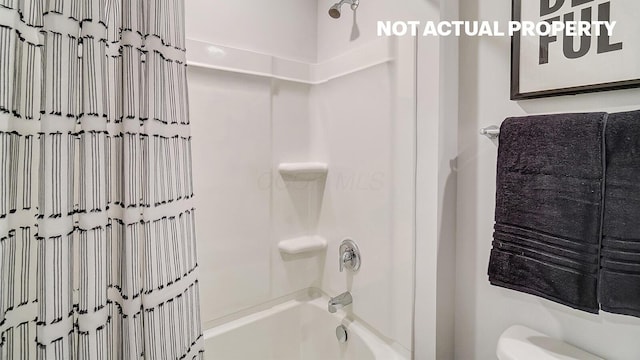 full bath featuring toilet and shower / washtub combination