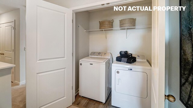 laundry room featuring laundry area and washing machine and dryer