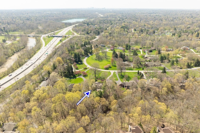 aerial view with a wooded view