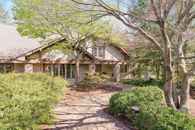 view of front of home featuring a pergola