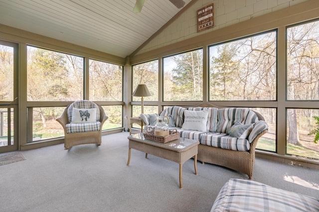 sunroom featuring outdoor lounge area and ceiling fan