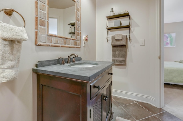 bathroom with tile patterned floors and vanity