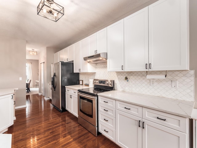 kitchen featuring under cabinet range hood, white cabinets, and stainless steel appliances