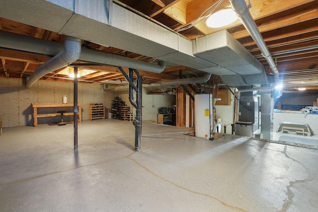 unfinished basement featuring water heater