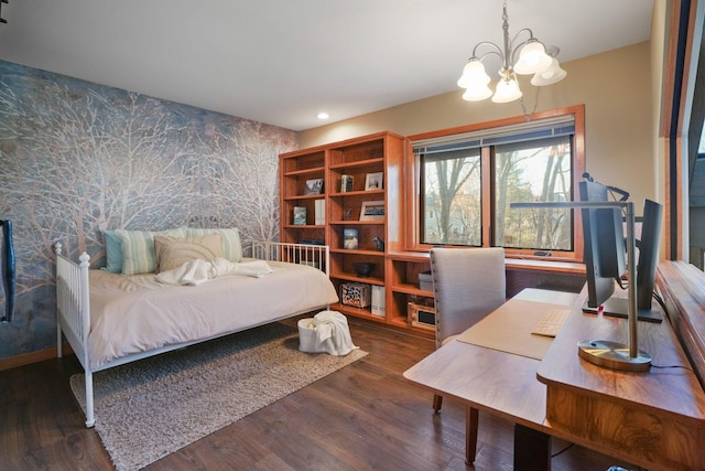 bedroom featuring an accent wall, wood finished floors, wallpapered walls, recessed lighting, and a notable chandelier