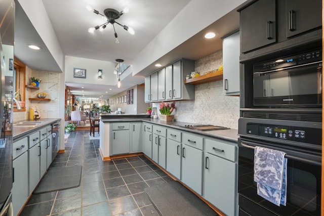 kitchen with open shelves, dark countertops, a peninsula, tasteful backsplash, and black appliances