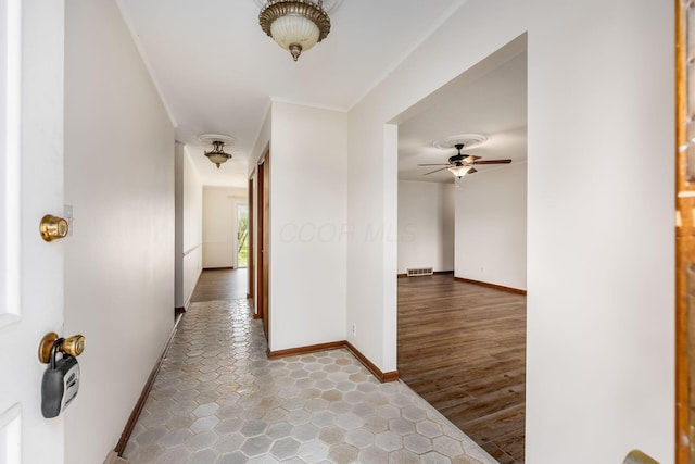 306 Northview Dr, London, OH 43140 - hallway featuring baseboards, tile patterned floors, and visible vents