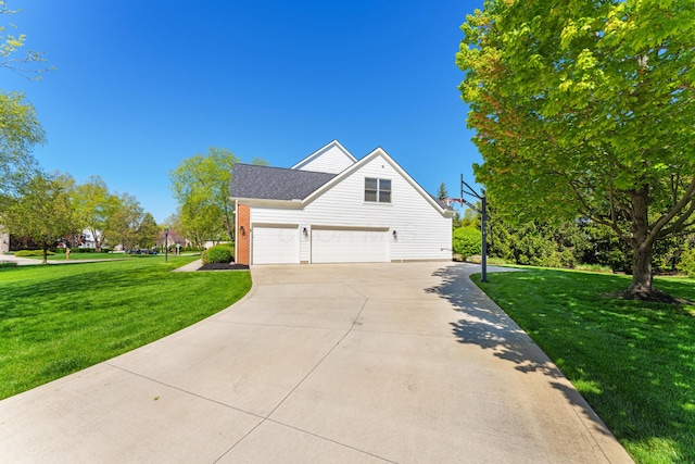 traditional home with driveway and a front yard