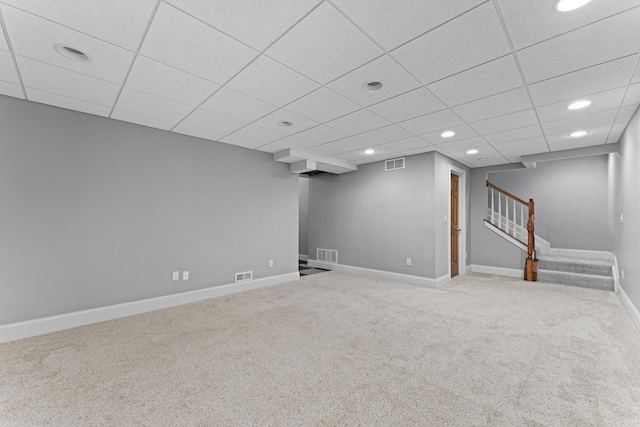finished below grade area with recessed lighting, carpet flooring, and visible vents