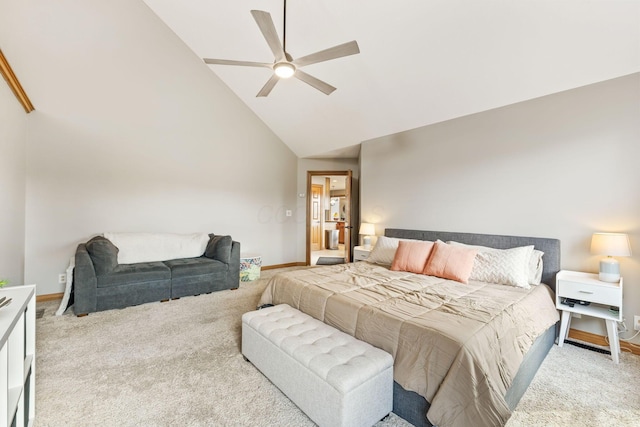 bedroom featuring ceiling fan, light carpet, high vaulted ceiling, and baseboards