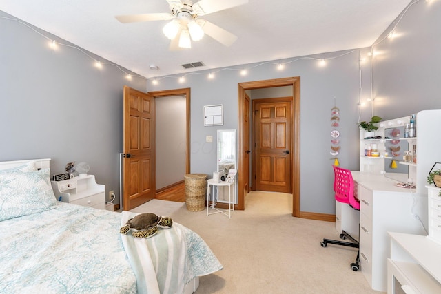 bedroom with ceiling fan, light colored carpet, baseboards, and visible vents