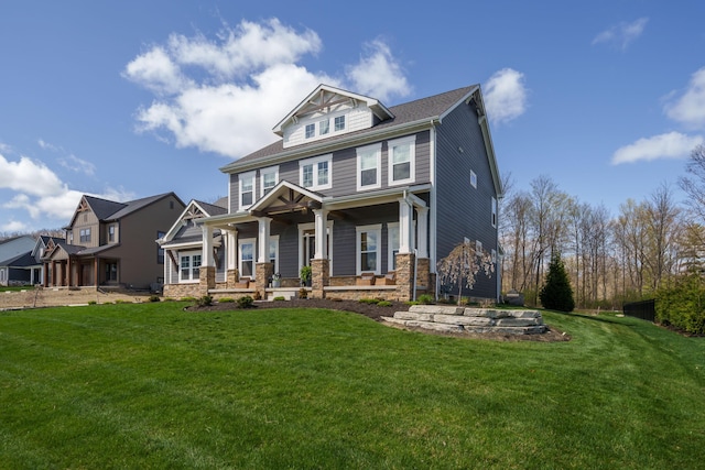 view of front facade featuring a front lawn and a porch