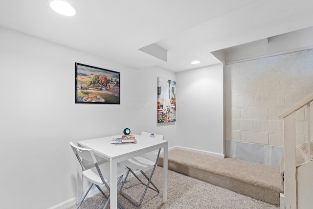 carpeted dining area featuring baseboards and recessed lighting