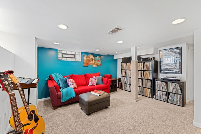 carpeted living room featuring recessed lighting and baseboards