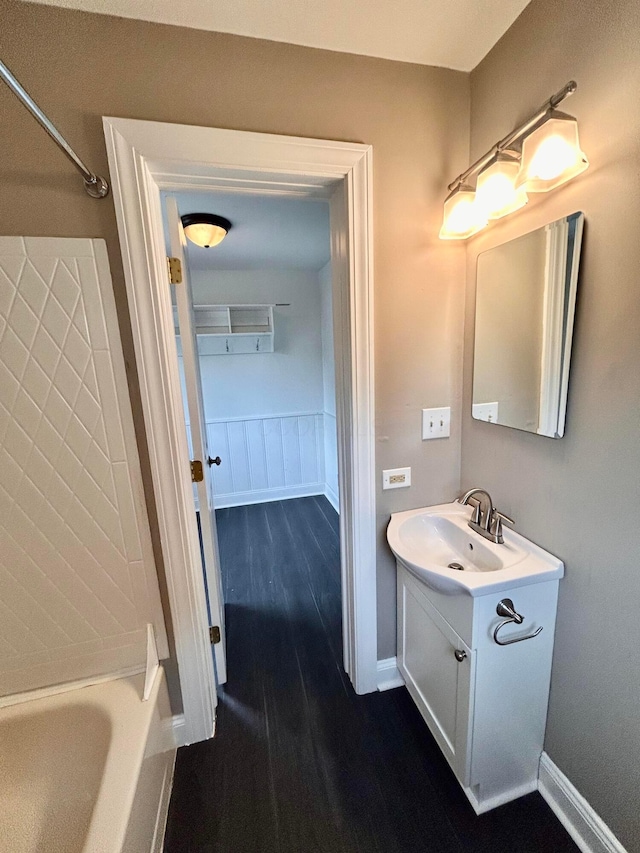 742 S Cassingham Rd, Bexley, OH 43209 - bathroom with vanity, wood finished floors, and shower / tub combination