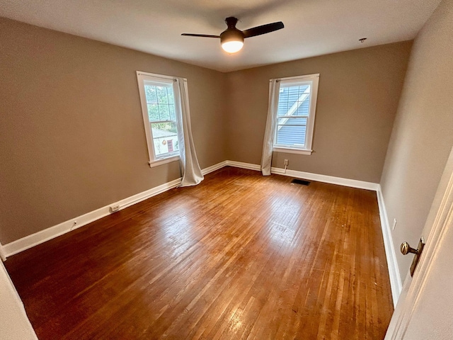 742 S Cassingham Rd, Bexley, OH 43209 - spare room featuring healthy amount of natural light, wood finished floors, and ceiling fan
