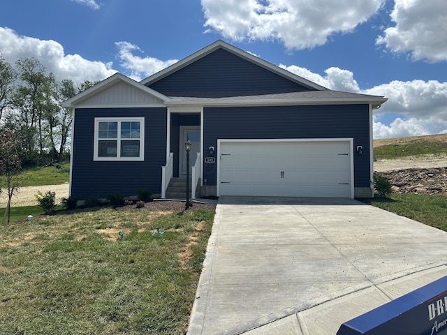 143 Badger Pass, Newark, OH 43055 - ranch-style house with a front yard, driveway, and a garage