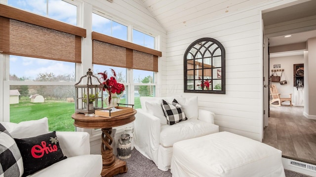 5456 Skyline Dr, Cambridge, OH 43725 - interior space with wood finished floors, plenty of natural light, lofted ceiling, and visible vents