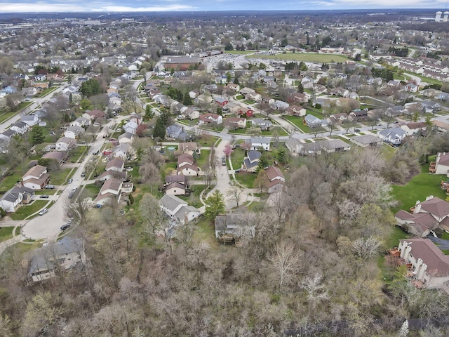 birds eye view of property with a residential view