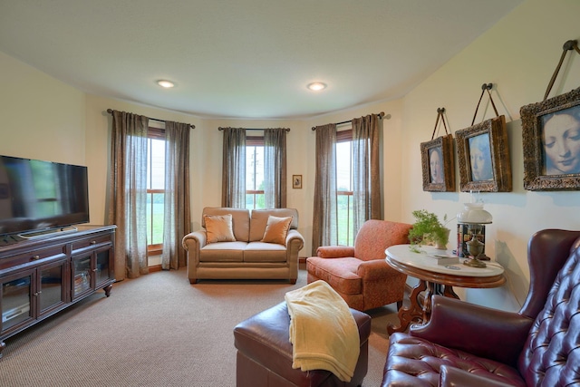 carpeted living area featuring recessed lighting