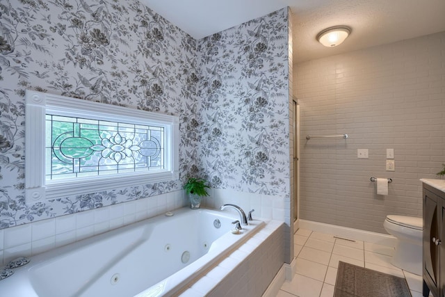 full bathroom featuring baseboards, wallpapered walls, vanity, a jetted tub, and tile patterned flooring