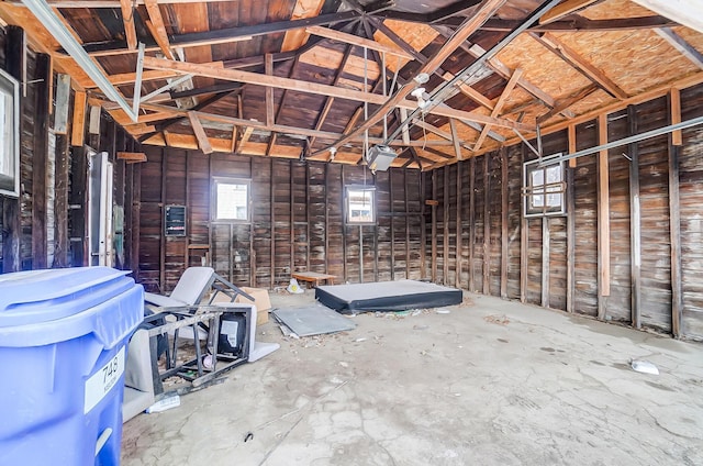 misc room with a garage