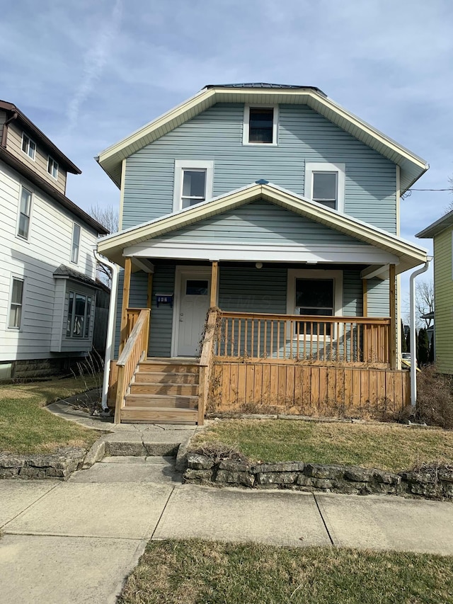 142 Pennsylvania Ave, Marion, OH 43302 - american foursquare style home featuring covered porch
