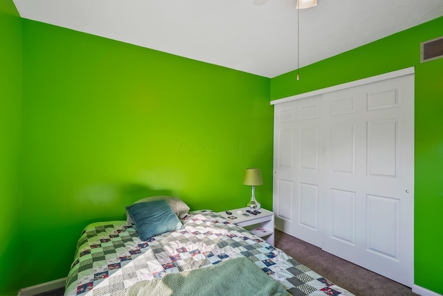 3588 Silverado Dr, Columbus, OH 43228 - bedroom with dark colored carpet, visible vents, and a closet
