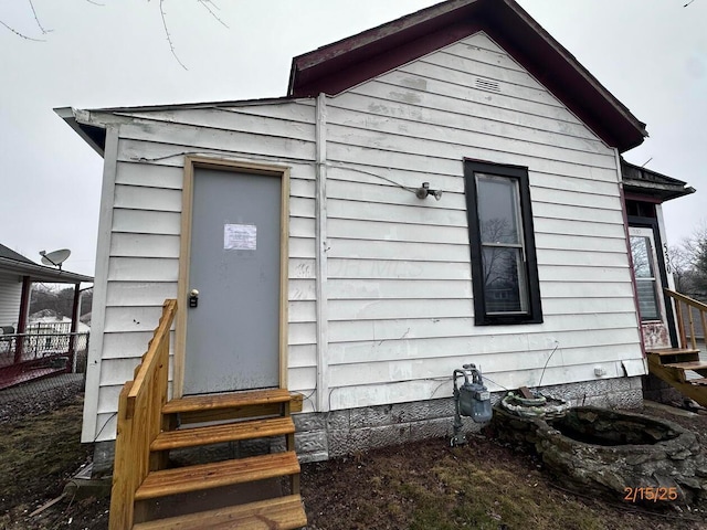 530 Harrison St, New Lexington, OH 43764 - exterior space with fence and entry steps