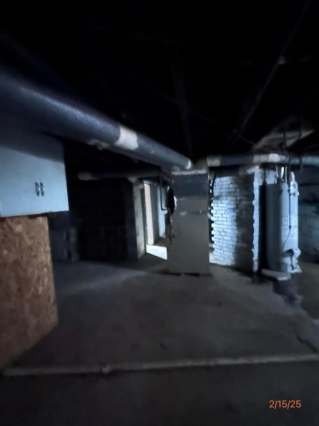 530 Harrison St, New Lexington, OH 43764 - unfinished basement with gas water heater