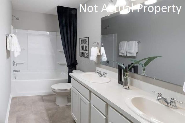 full bath featuring tile patterned flooring, a sink, shower / bathtub combination, and toilet
