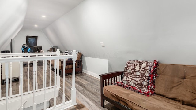 sitting room featuring recessed lighting, baseboards, lofted ceiling, and wood finished floors