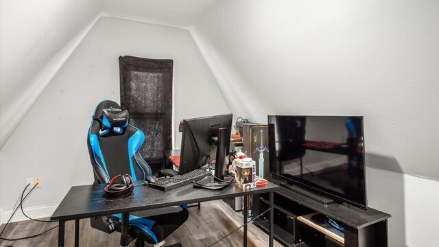 office featuring wood finished floors and vaulted ceiling