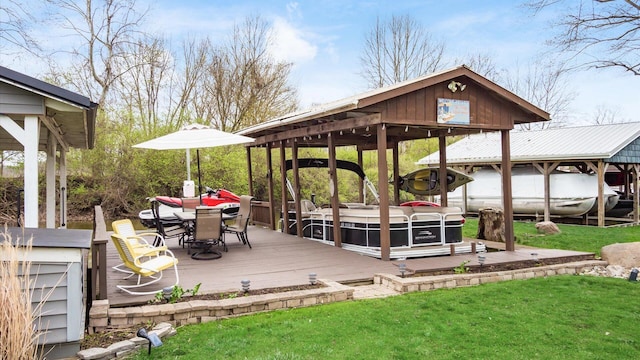 exterior space with boat lift and a yard