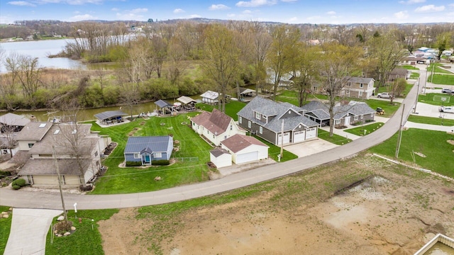 aerial view featuring a water view and a residential view