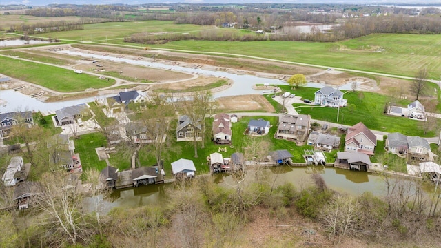 aerial view featuring a water view and a residential view