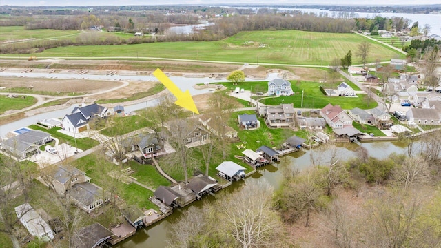 aerial view featuring a water view and a residential view