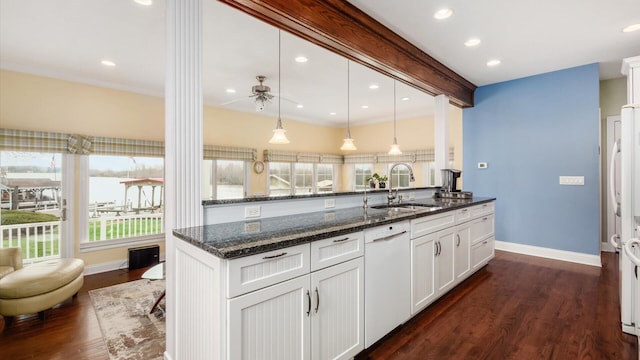 40 Beacon Light Ln, Buckeye Lake, OH 43008 - kitchen featuring white dishwasher, dark wood-style floors, white cabinetry, and a sink