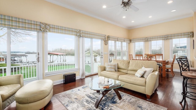40 Beacon Light Ln, Buckeye Lake, OH 43008 - living room featuring crown molding, baseboards, a ceiling fan, and wood finished floors