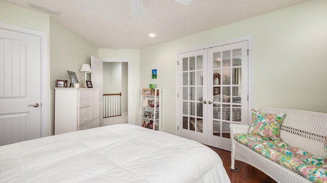 40 Beacon Light Ln, Buckeye Lake, OH 43008 - bedroom with visible vents, french doors, recessed lighting, and wood finished floors