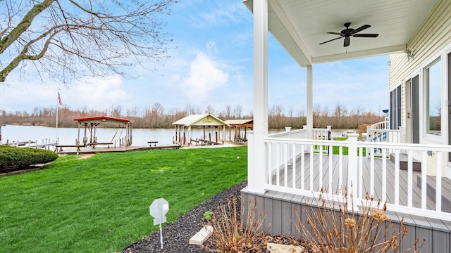 40 Beacon Light Ln, Buckeye Lake, OH 43008 - view of yard with a water view, a boat dock, and a ceiling fan