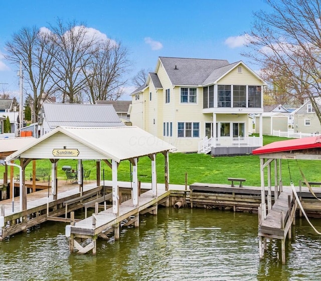 40 Beacon Light Ln, Buckeye Lake, OH 43008 - dock with a water view, boat lift, and a lawn