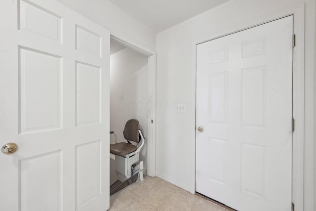 mudroom featuring baseboards