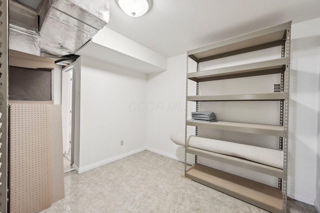 finished below grade area featuring baseboards