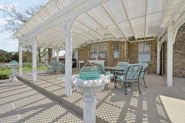 view of patio / terrace featuring outdoor dining space and a pergola