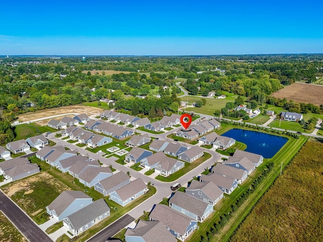 aerial view with a water view and a residential view
