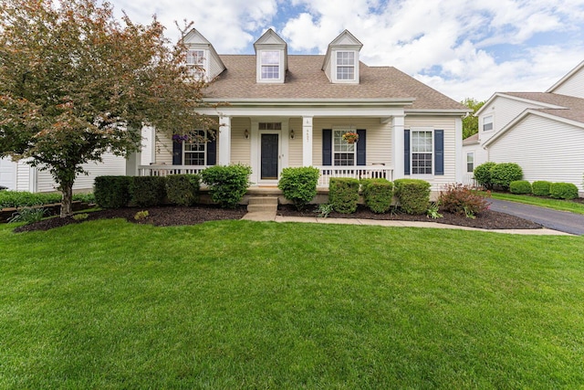 4497 Battles St, New Albany, OH 43054 - new england style home with a porch, a front lawn, and a shingled roof