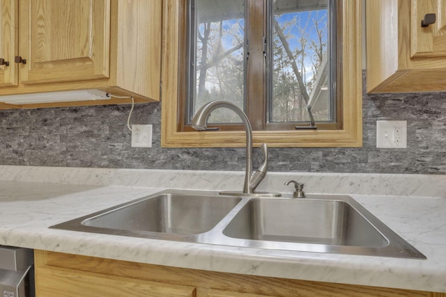 8015 Alspach Rd NW, Lancaster, OH 43130 - room details featuring a sink, tasteful backsplash, and light brown cabinetry